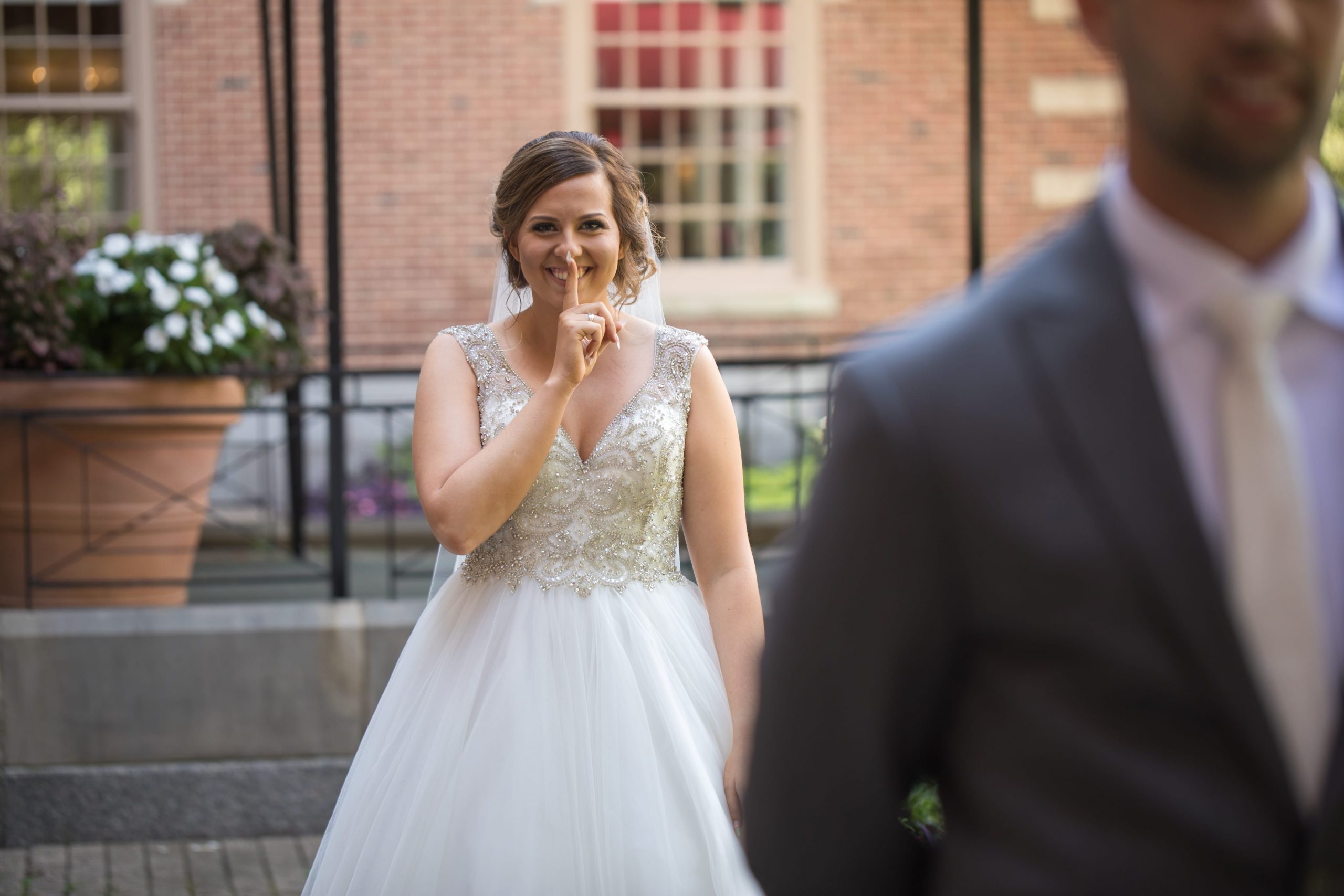 bride behind groom before first look