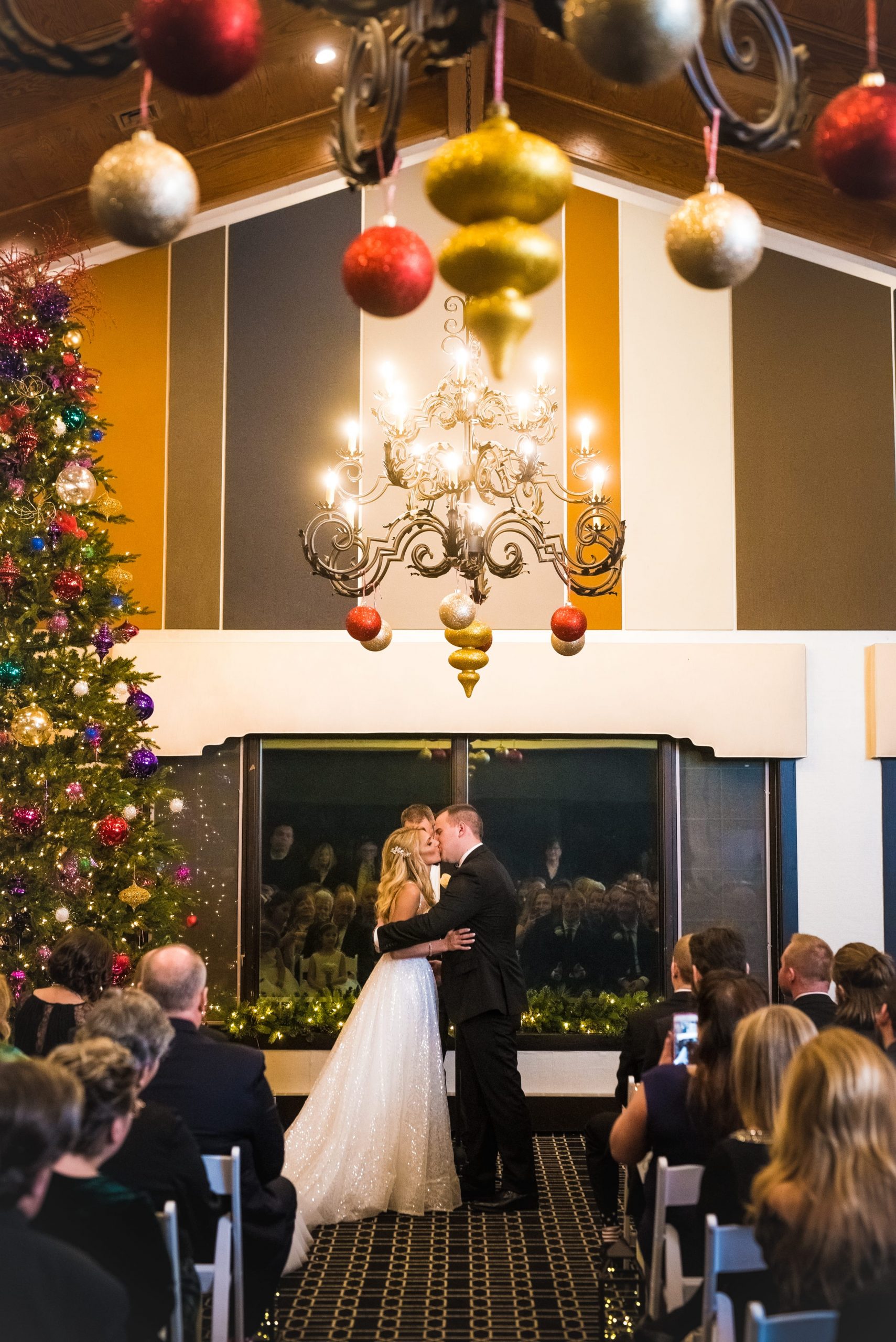 bride and groom kissing wedding ceremony