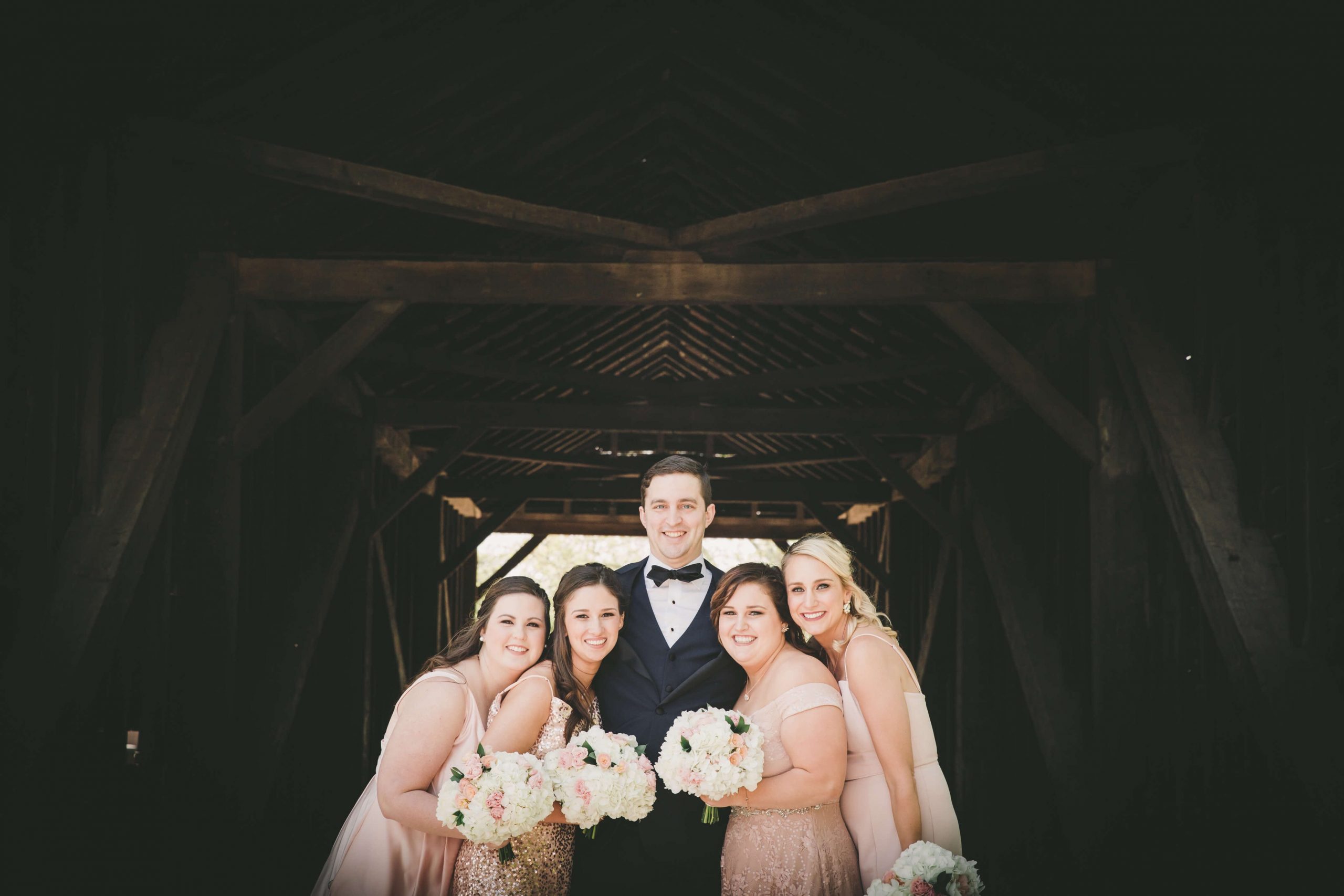 groom with bridesmaids