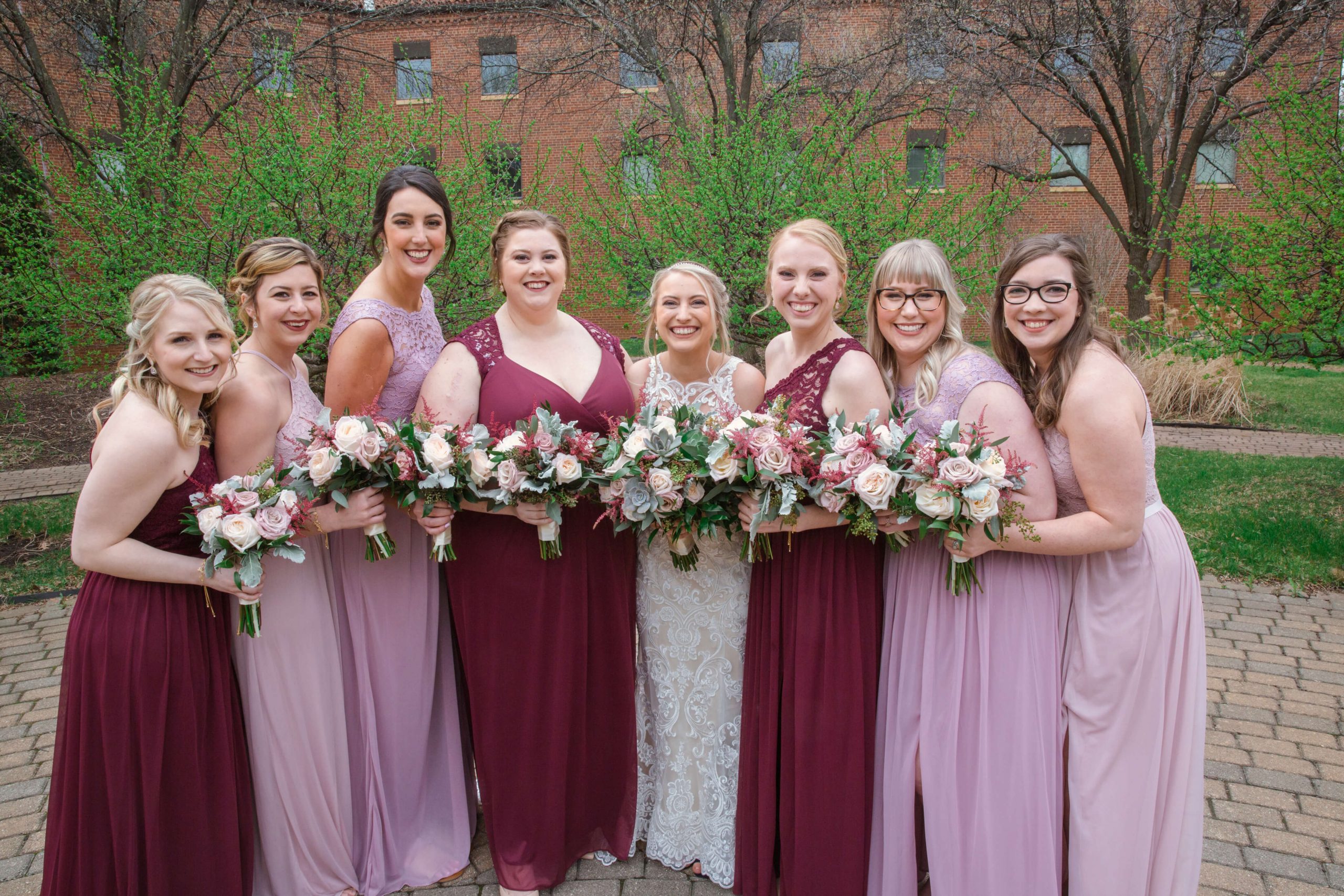 bridesmaids in blush and maroon