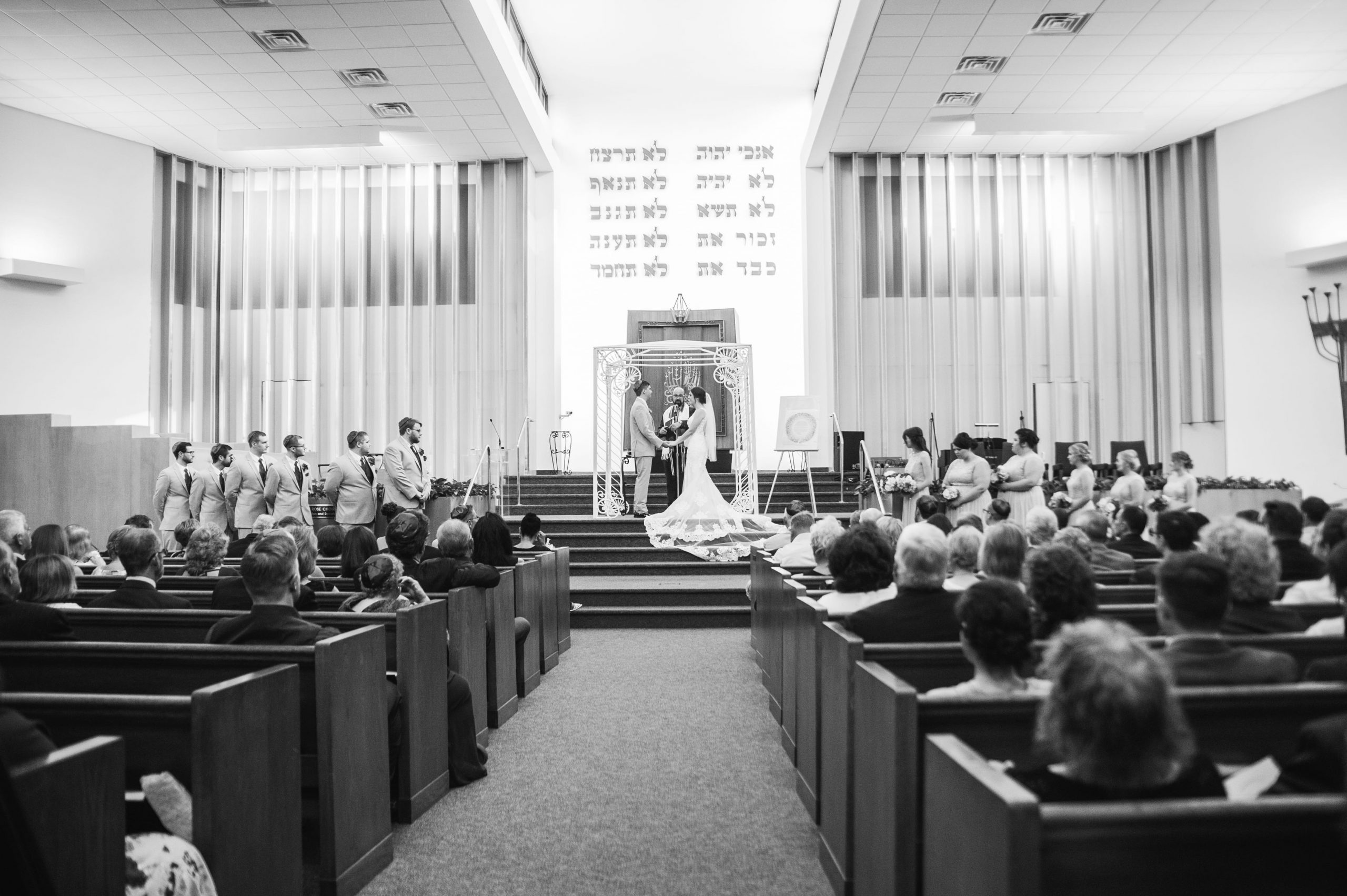 bride and groom at alter