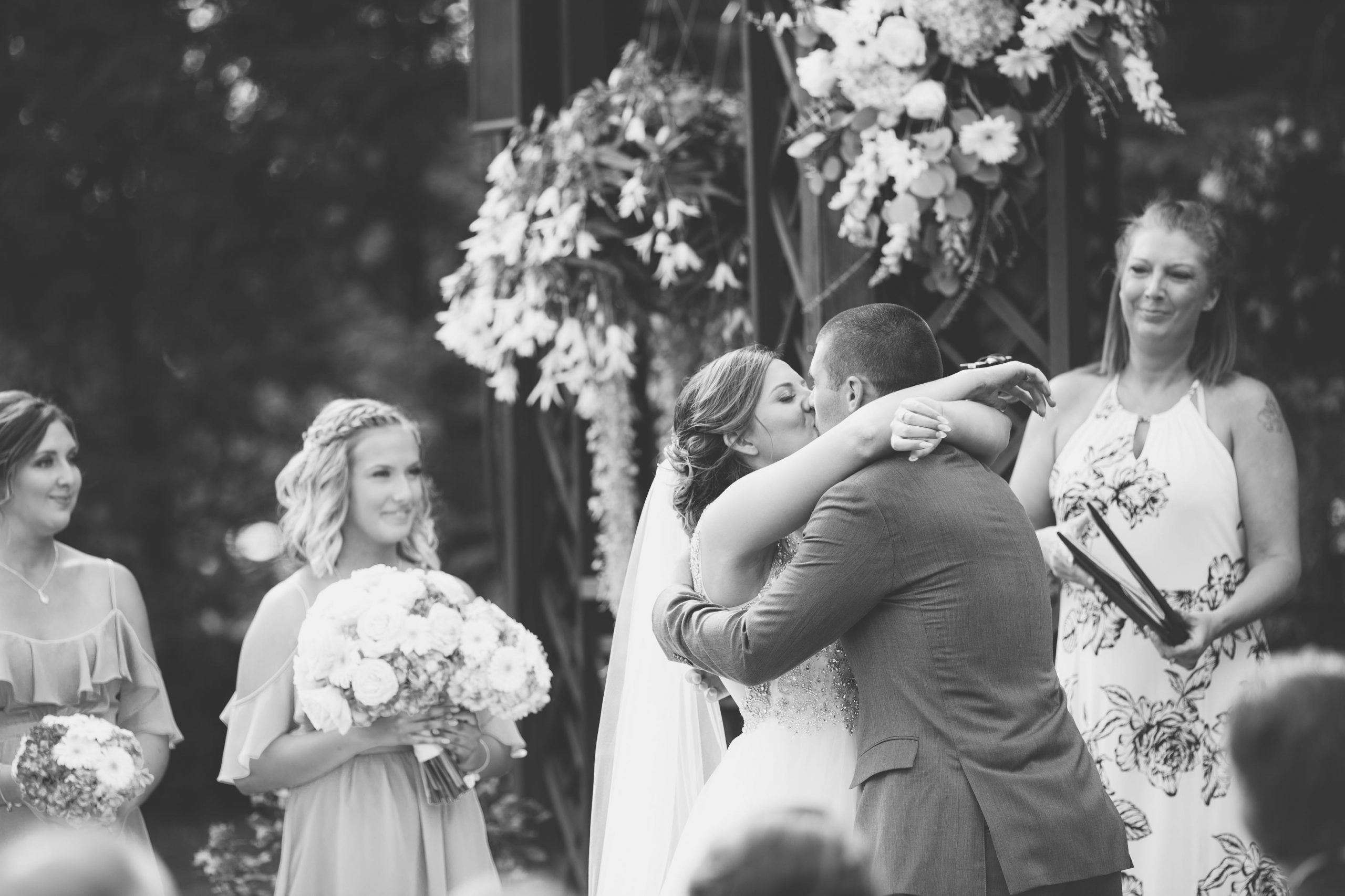 bride and groom's first kiss at ceremony