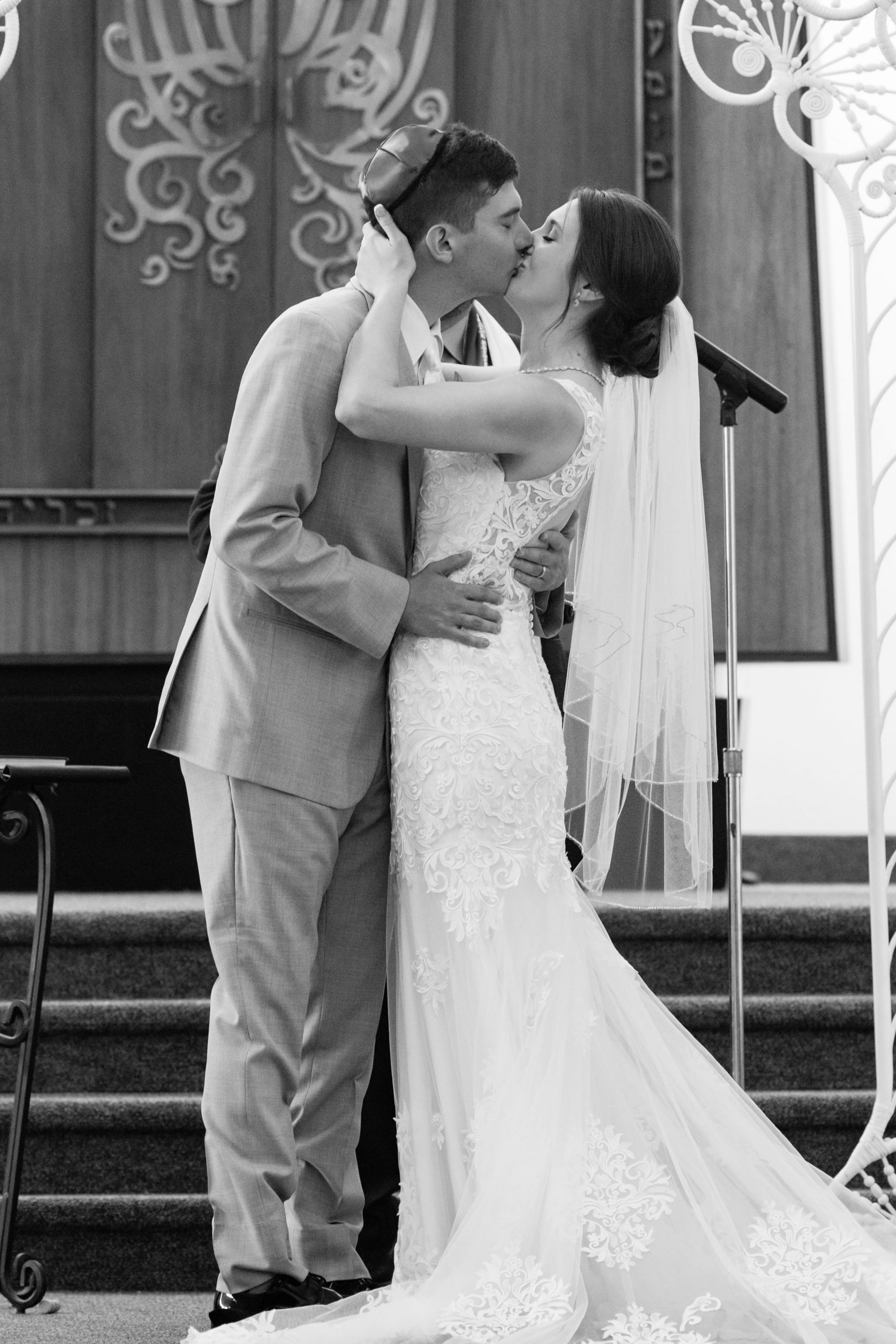 bride and groom kissing