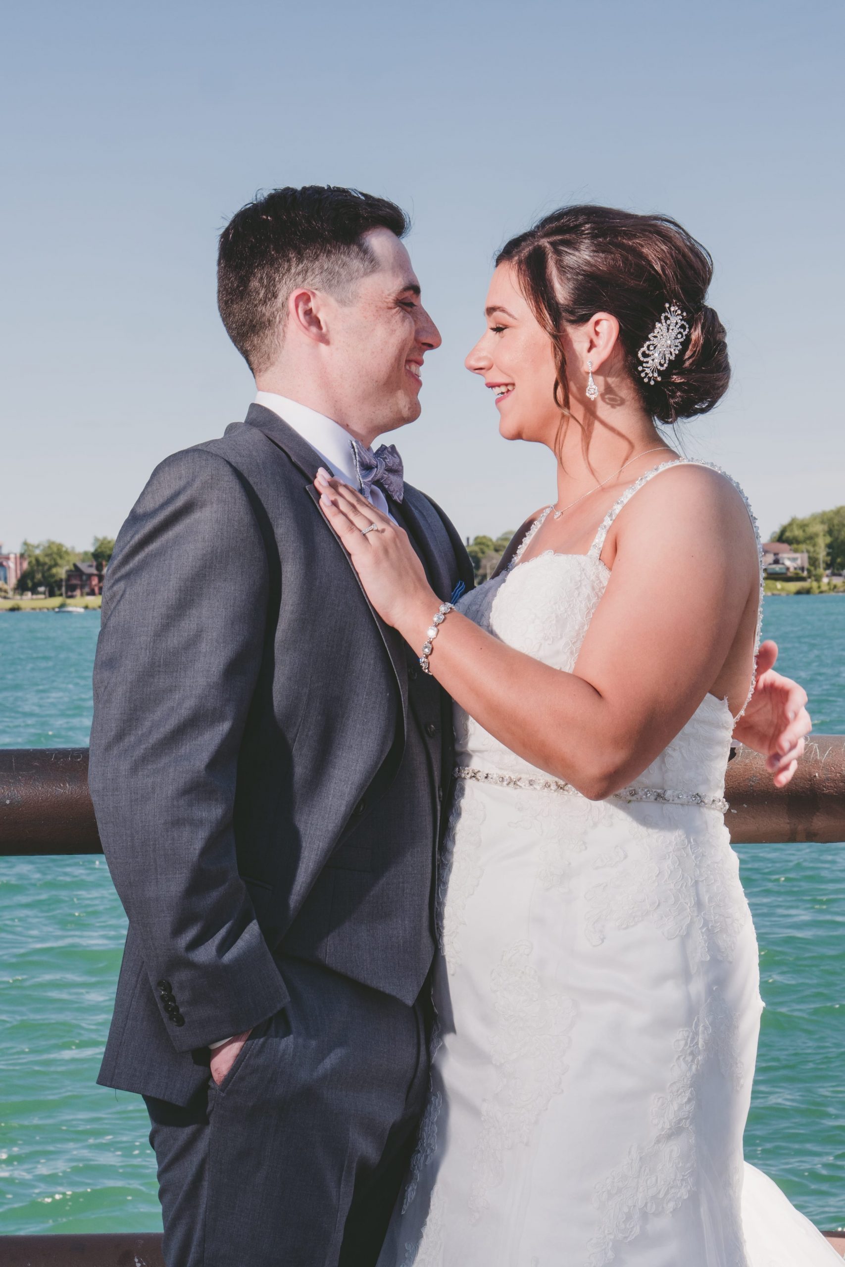 bride and groom wedding photography on the water