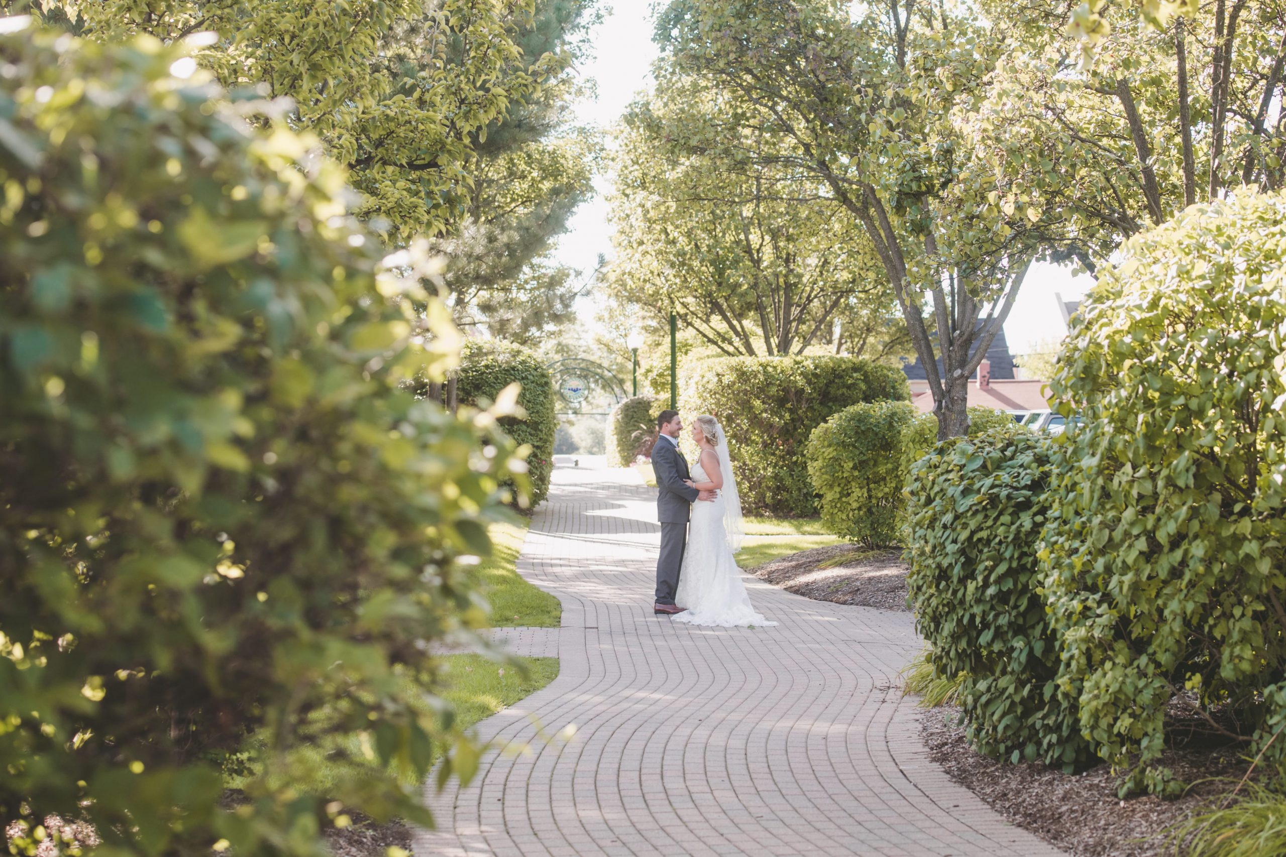 romantics outside on stone path