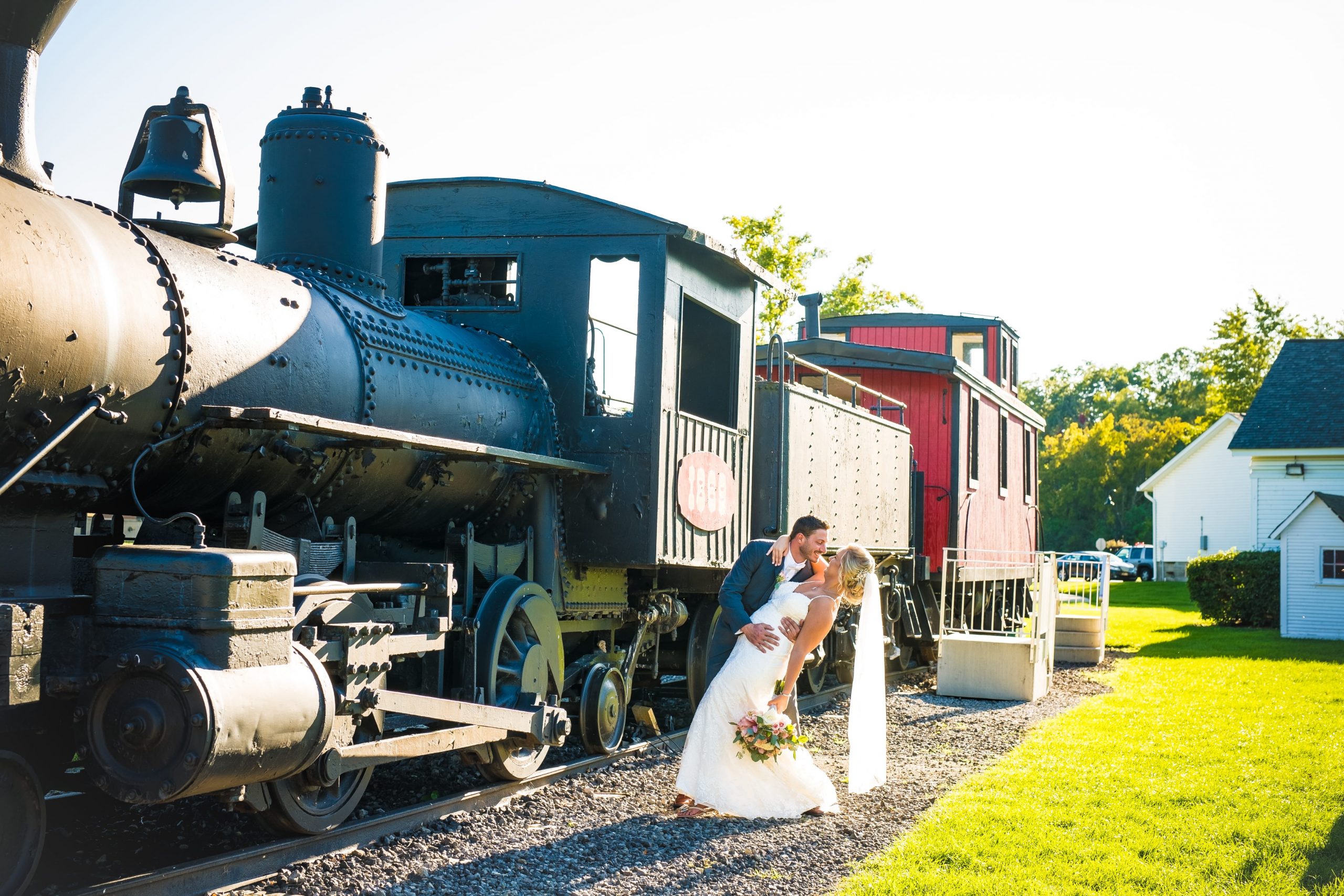 wedding day romantics by a train