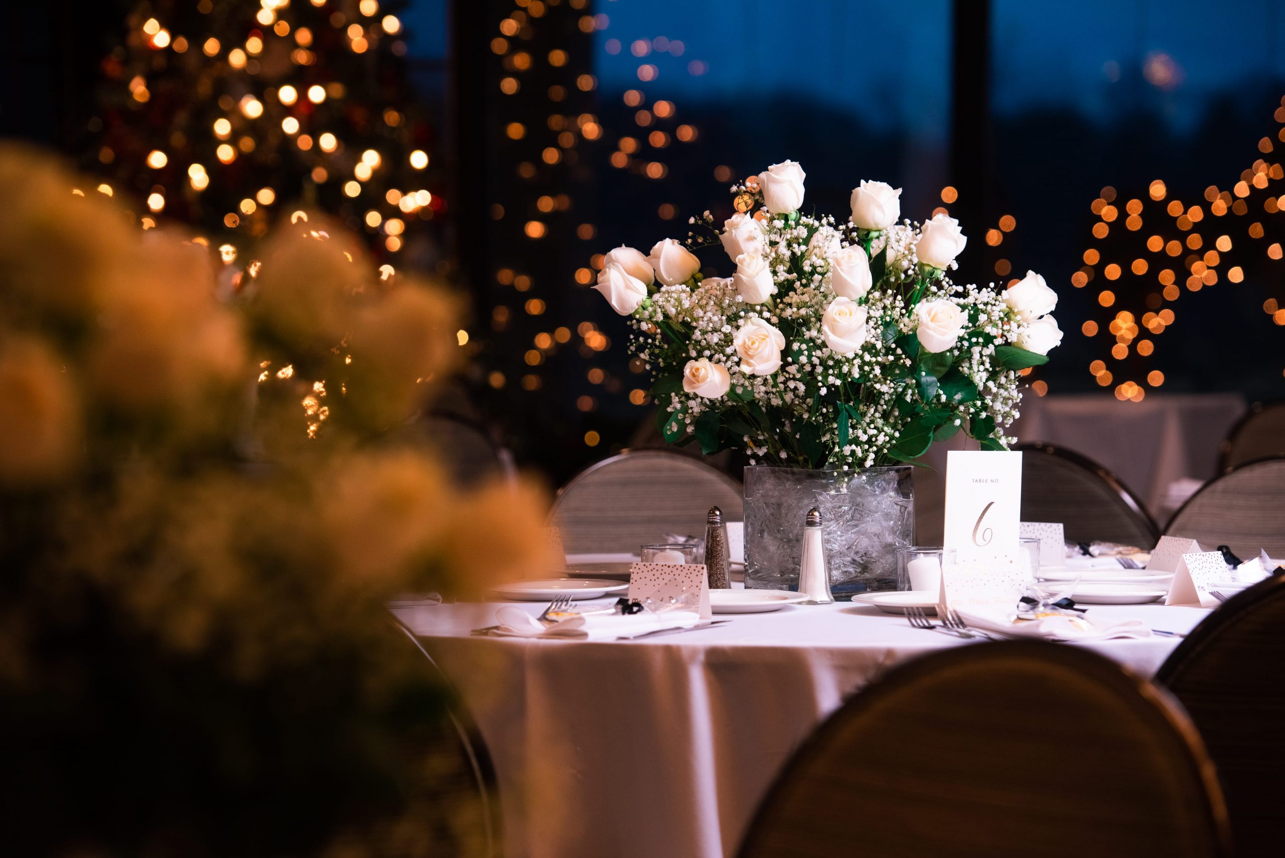 wedding reception white roses centerpiece