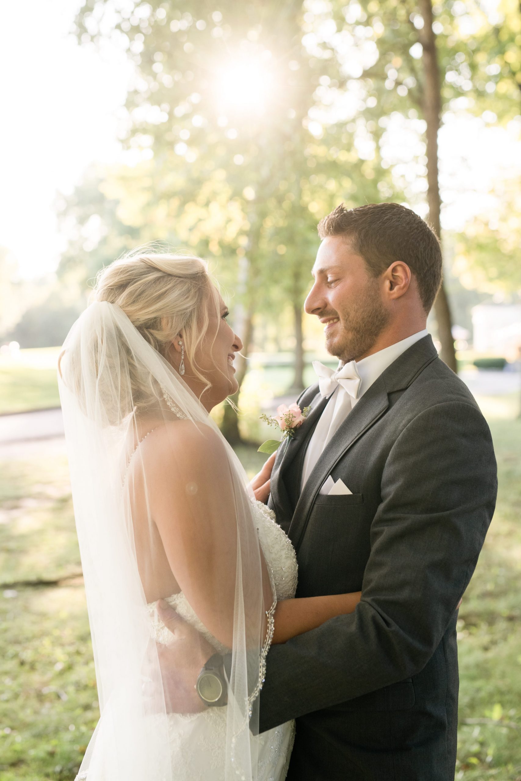 bride and groom looking at each other lovingly