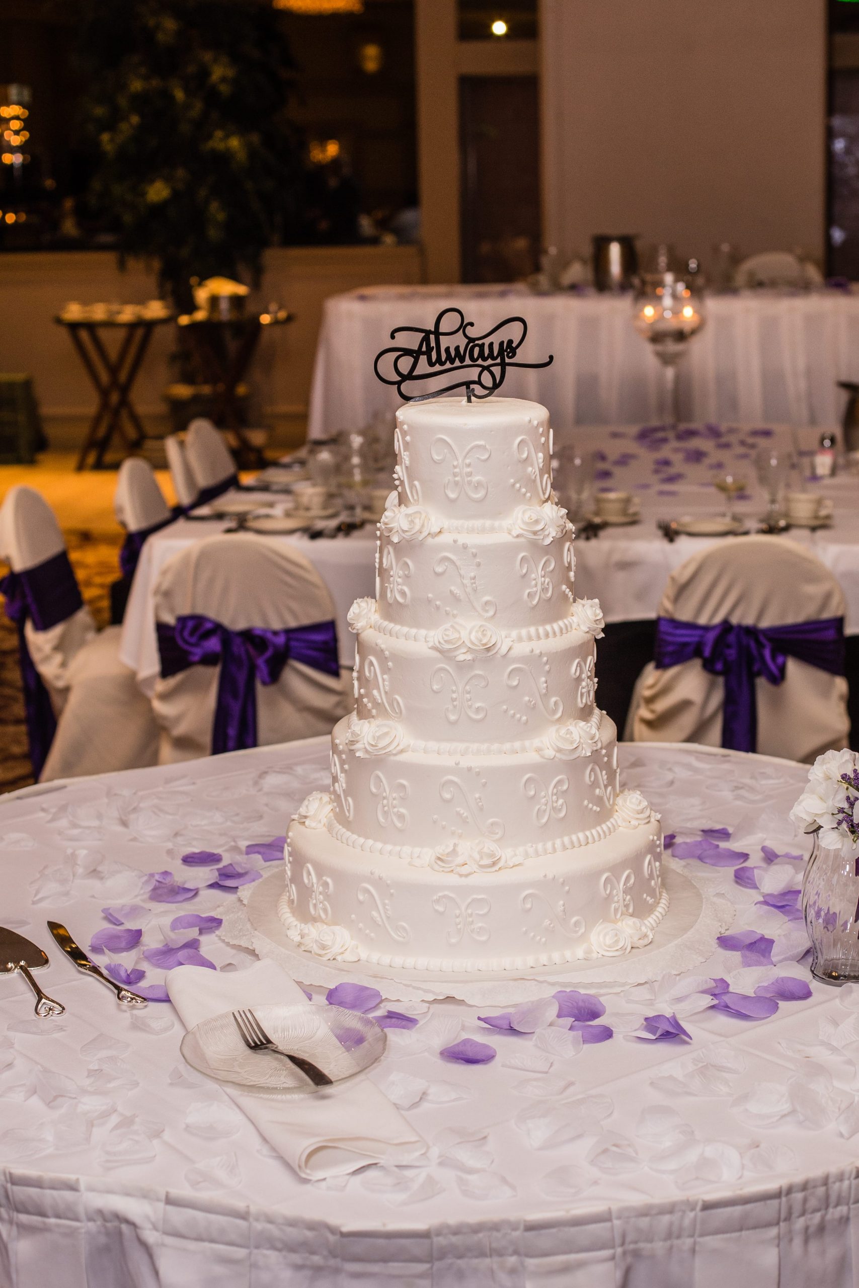 tiered wedding cake with "always" cake topper