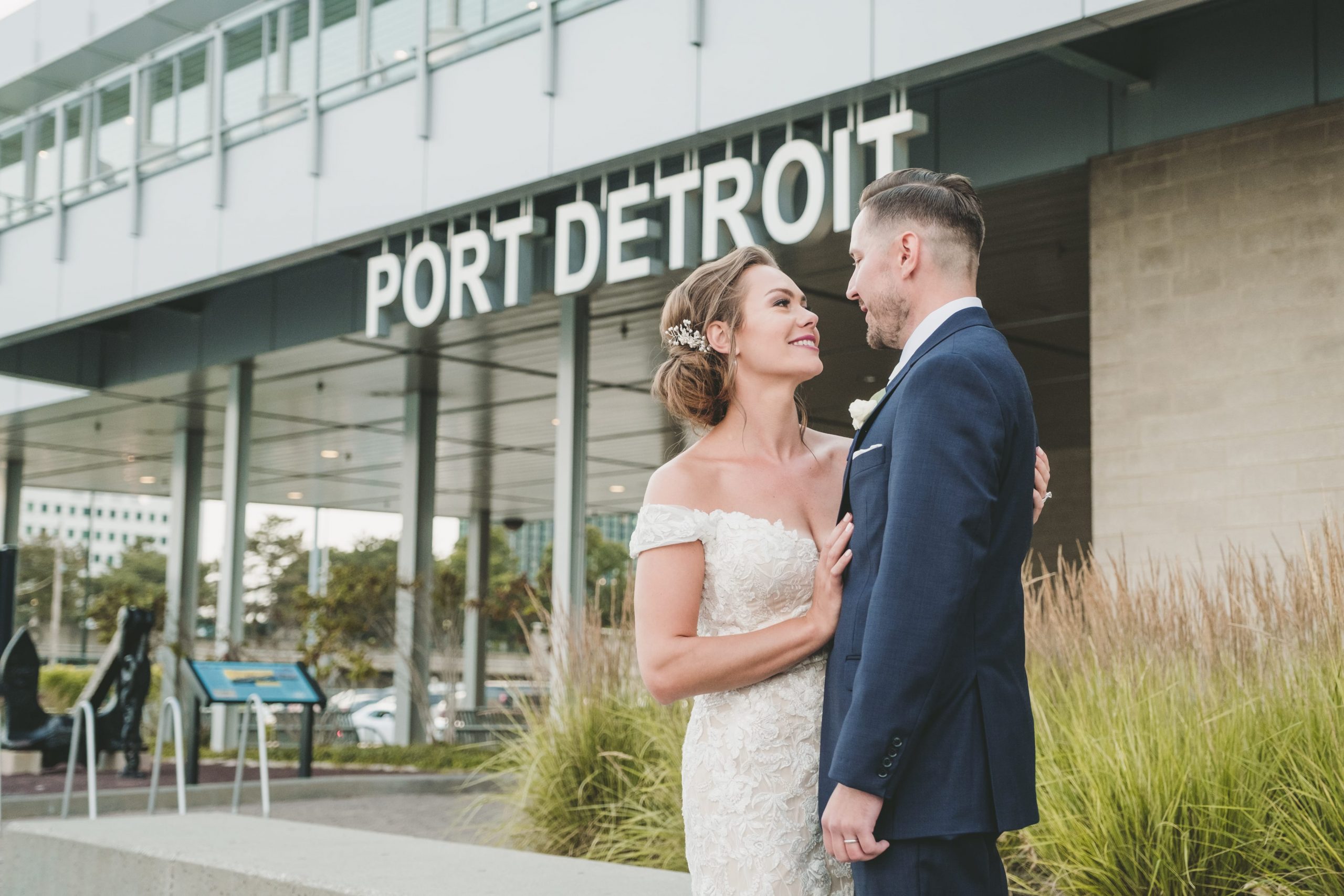 bride and groom outside waterview loft at port detroit