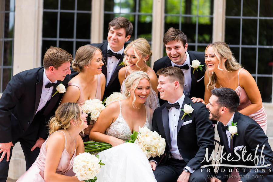 bridal party on pine knob mansion patio