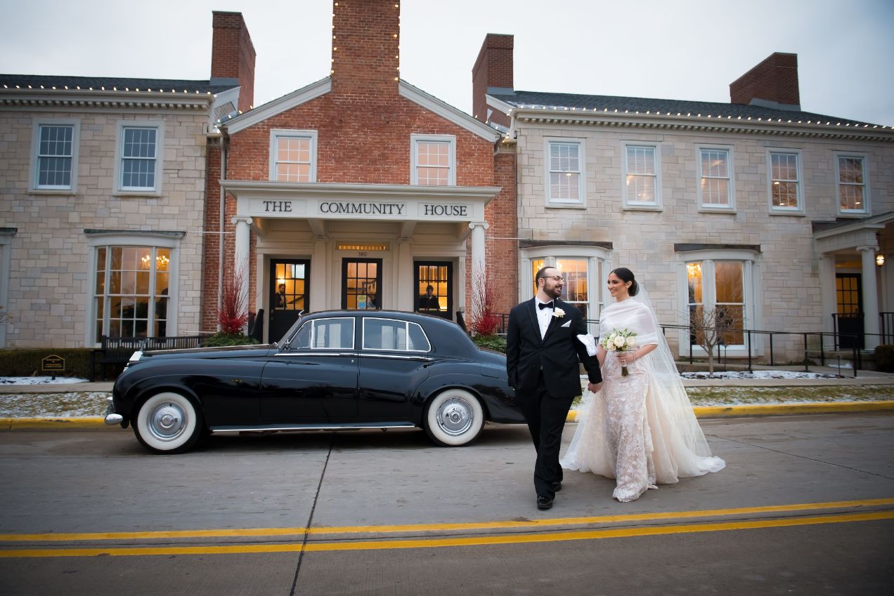 bride and groom at the community house