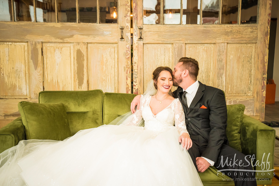 bride and groom green couch brooks wedding