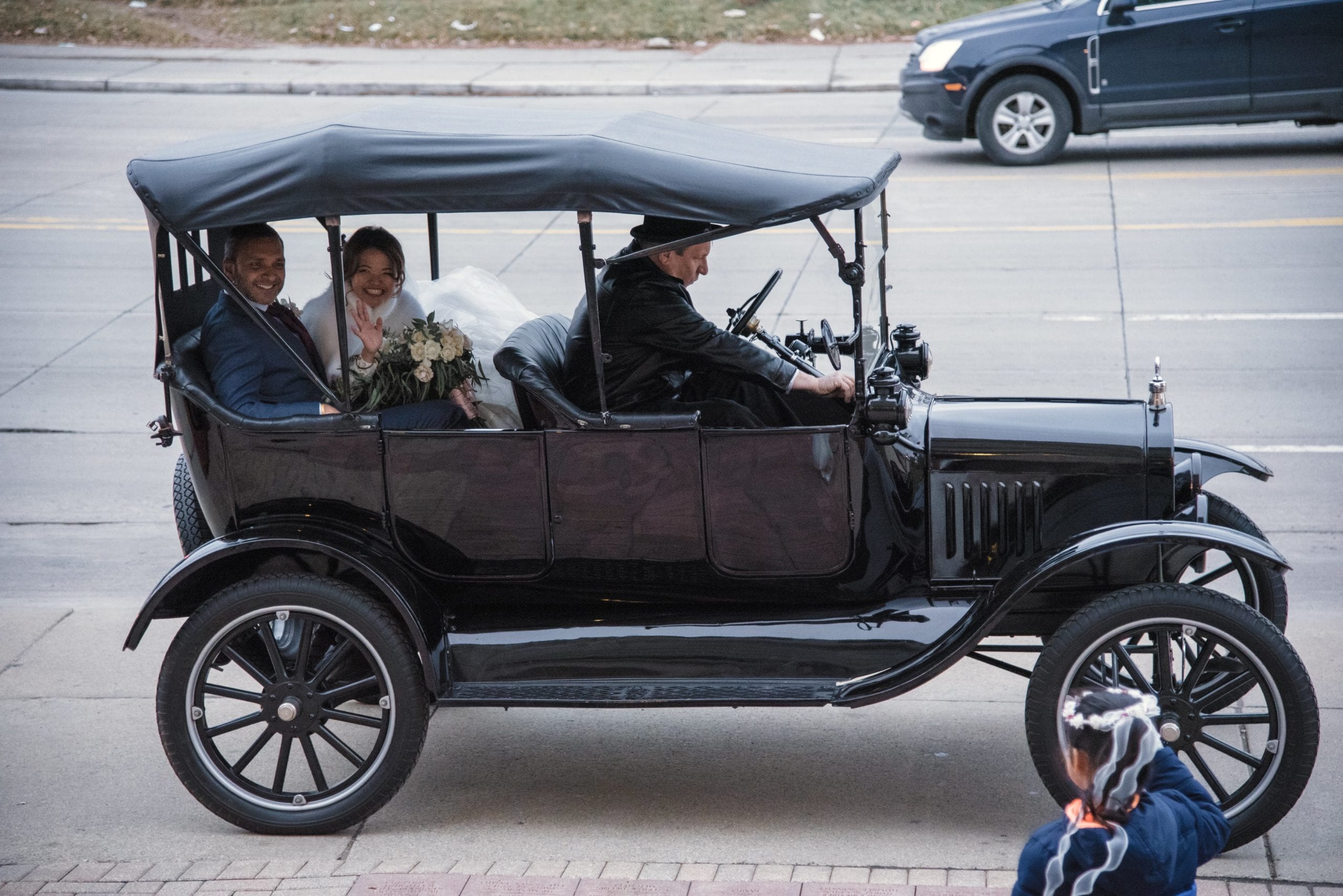 bride and groom in Ford Model T