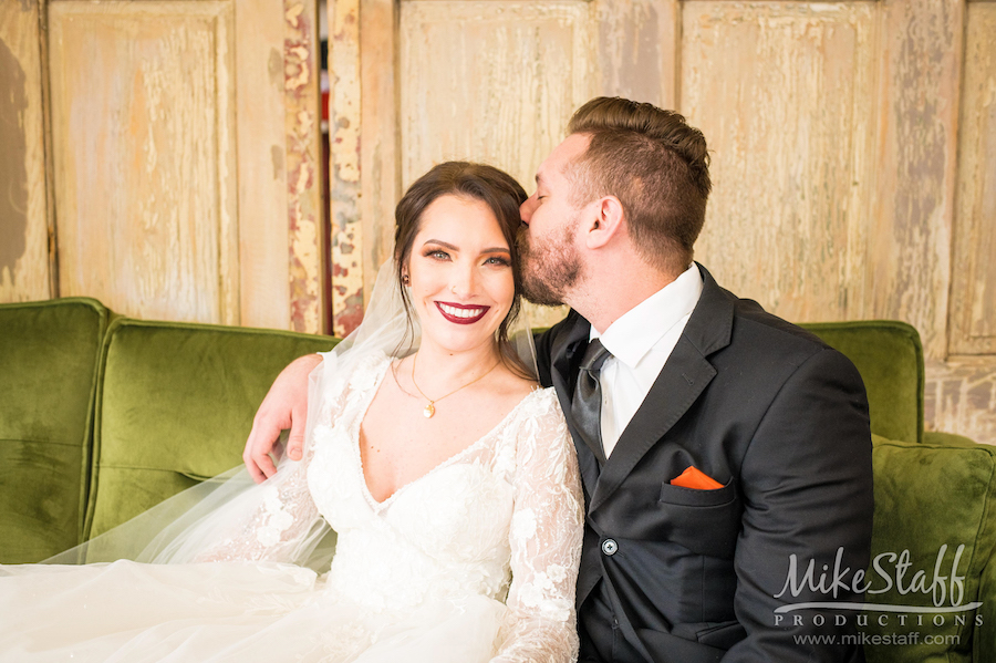 bride and groom kissing brooks wedding