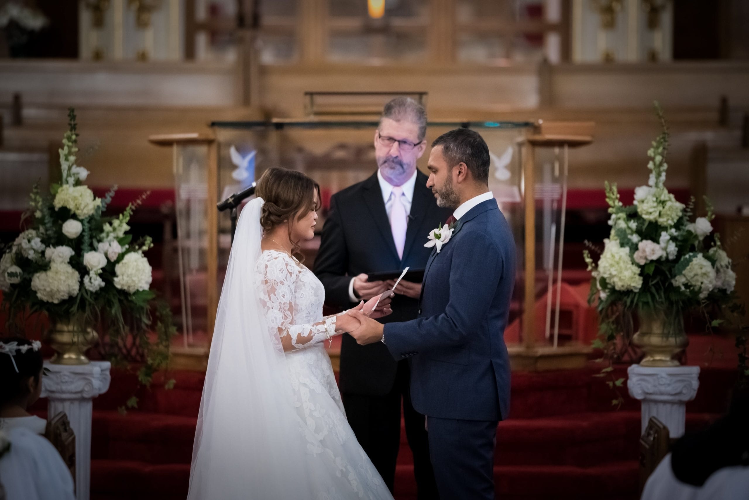 bride and groom saying vows