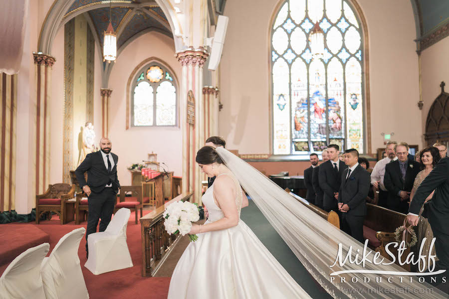 bride at altar Holy Cross Catholic Church