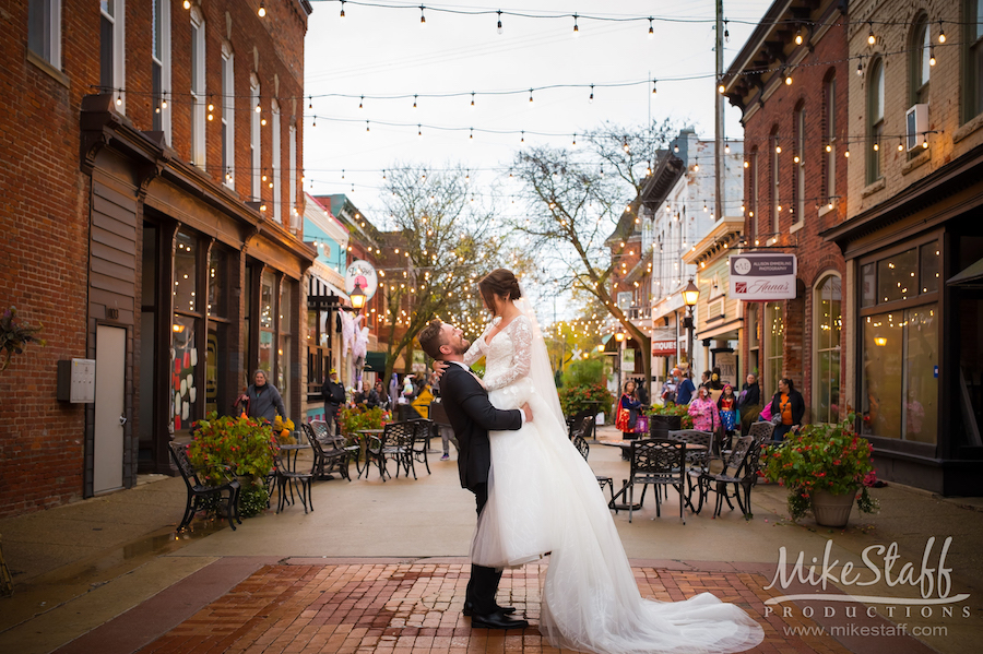 downtown holly groom lifting bride