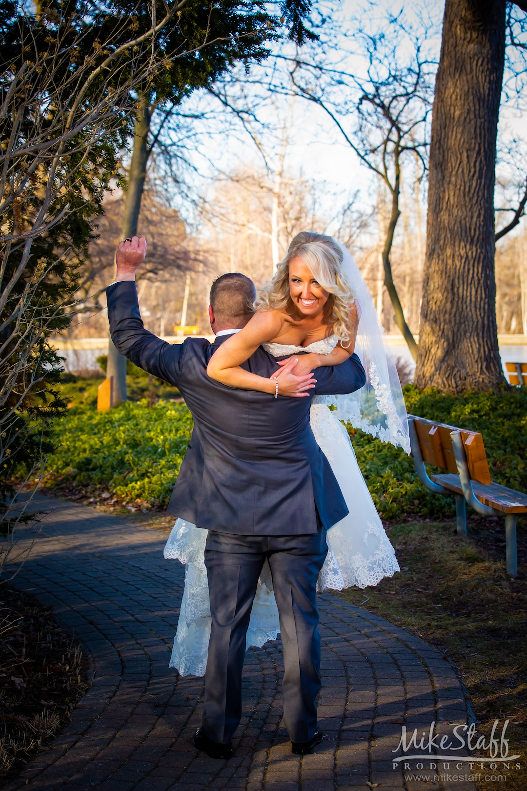 groom lifting bride