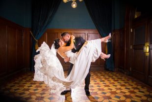 groom picking up and dipping bride