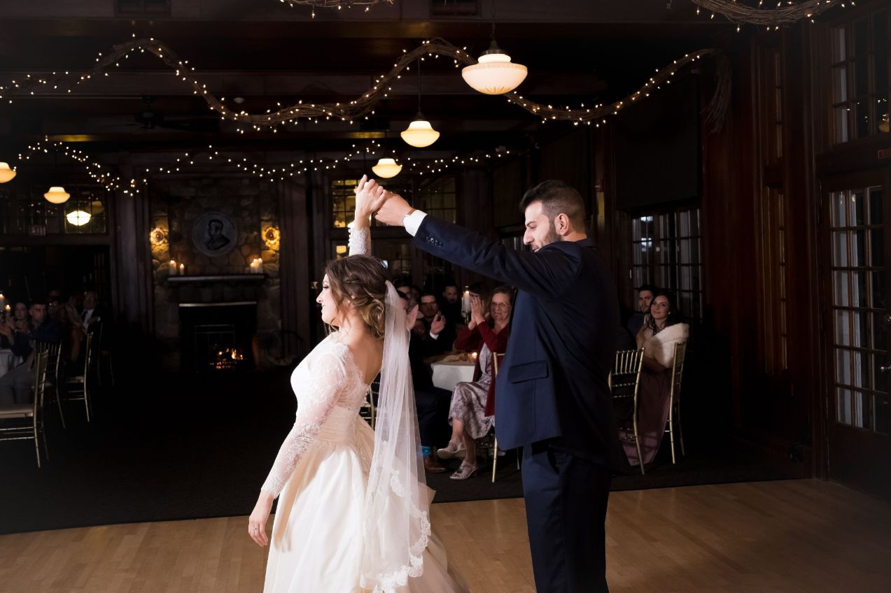 groom spinning bride