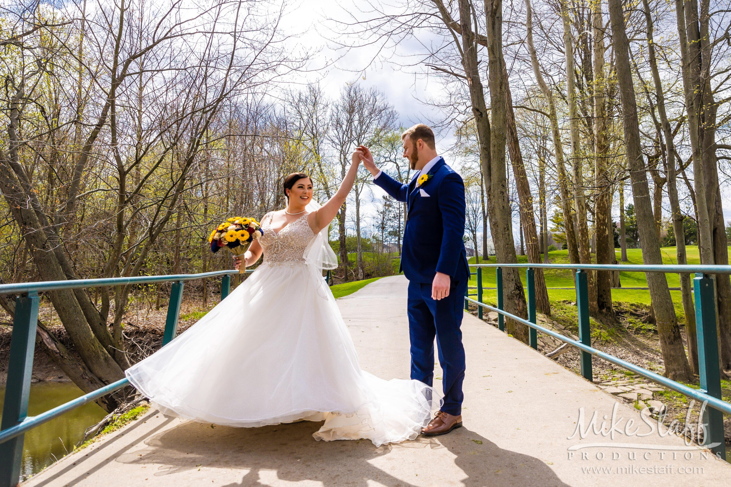 groom spinning bride at sycamore hills