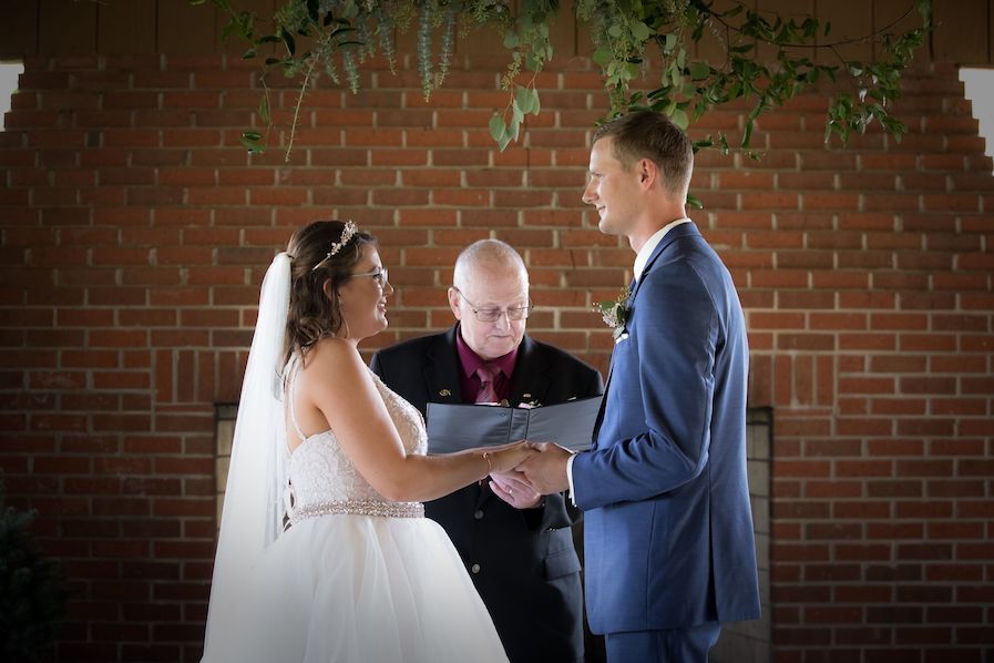 lindsay and logan during ceremony