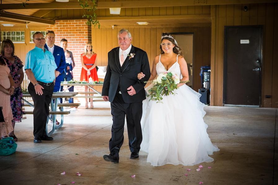 lindsay walking down aisle to see logan