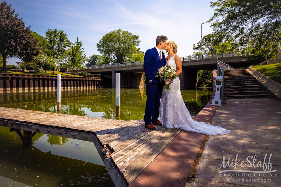 bride and groom on dock