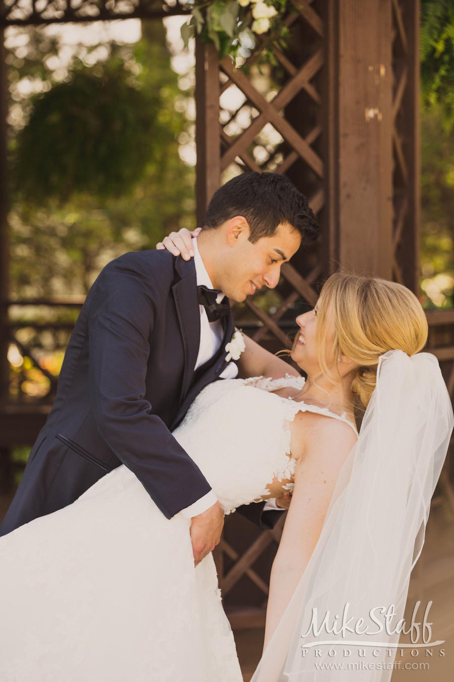 bride and groom outside