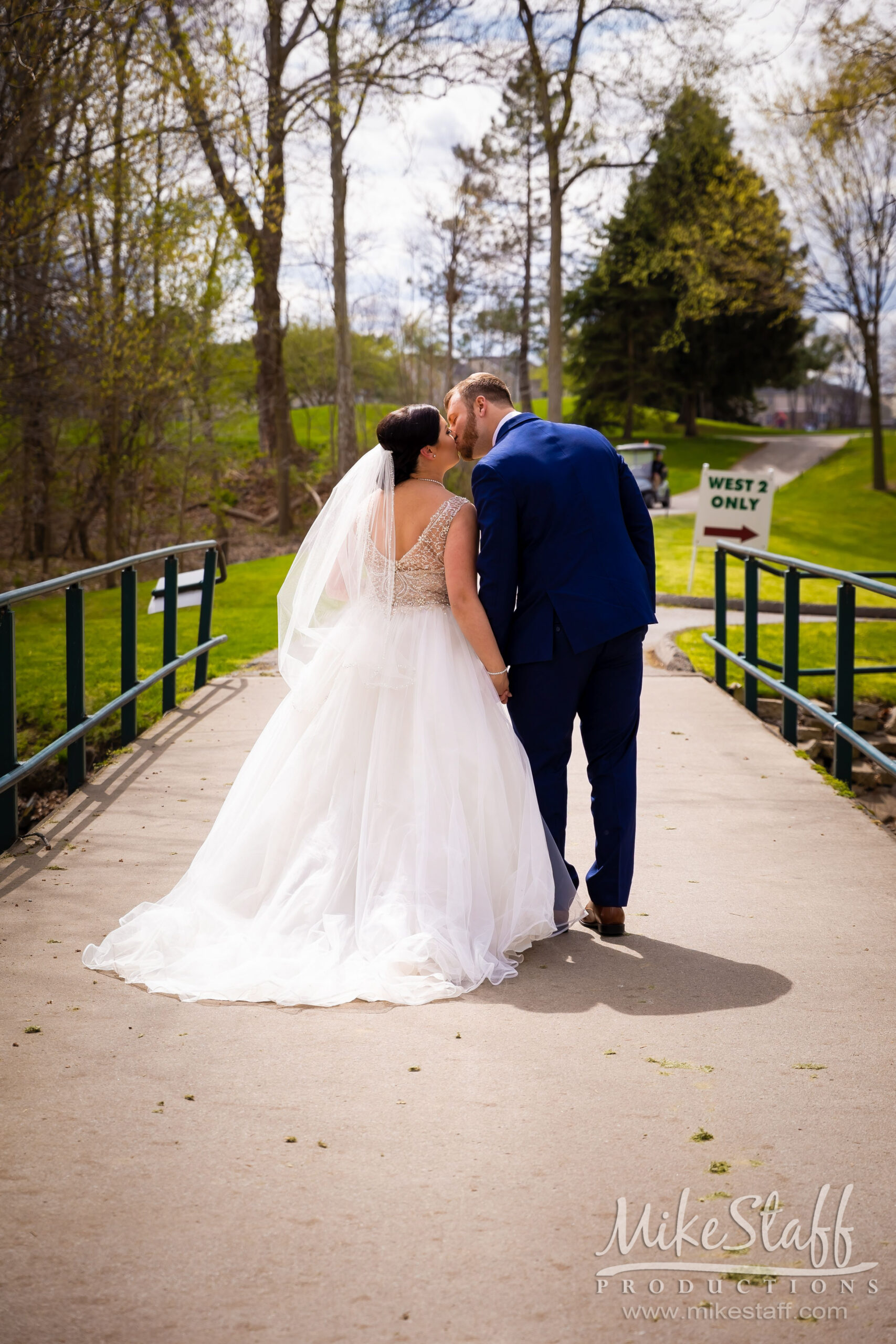 sycamore hills wedding photo on bridge