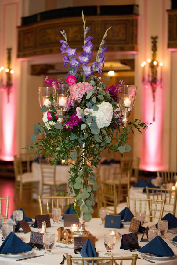 wedding uplighting with floral centerpiece