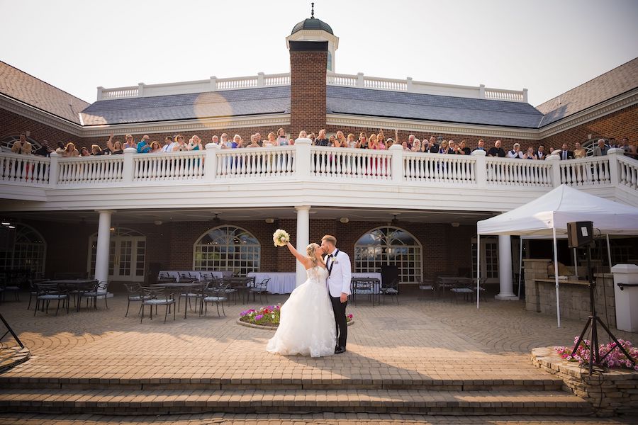 wedding guests on balcony_Szucsansky_Davis-E