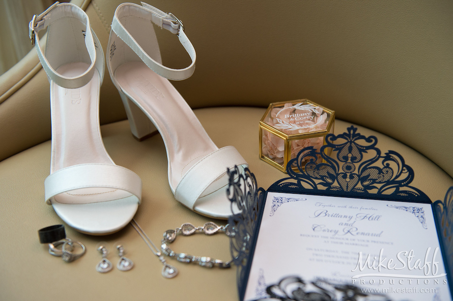 white bridal heels and jewelry